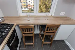 Small kitchen design with window sill