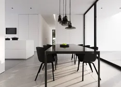 White Table With Black Chairs In The Kitchen Interior