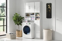 Photo of bathroom cabinets above the washing machine