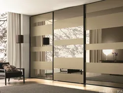 Photo of wall-sized modern bedroom wardrobes