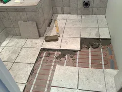 Tiles on the bathtub floor photo