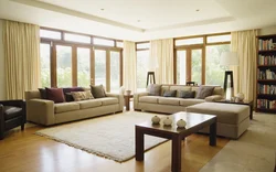 Living room window design with corner sofa