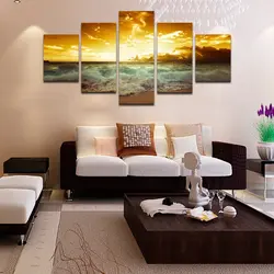 Modular paintings in the living room interior above the sofa