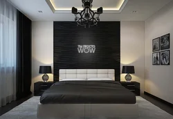Interior of a light bedroom with dark wallpaper