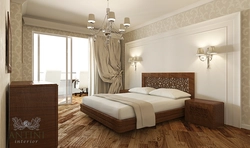 Interior of a light bedroom with dark wallpaper