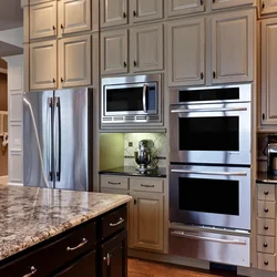 White Built-In Appliances In The Kitchen Interior Photo