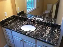 Black Countertop In The Bathroom Photo