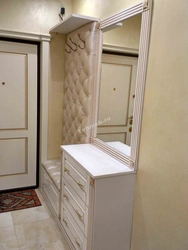 Hallway wardrobe with seat and mirror photo