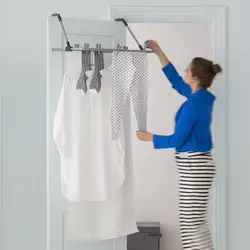 Clothes hangers in the bathroom photo