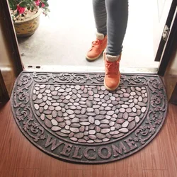 Rug by the door in the hallway photo