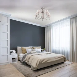 Bedroom design with gray bed and gray curtains