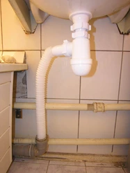 Sewer pipe in the kitchen photo