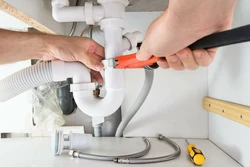 Sewer pipe in the kitchen photo