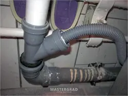 Sewer pipe in the kitchen photo