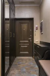 Photo of hallways in the corridor design with dark doors