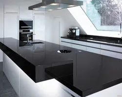 Black Glossy Countertop In The Kitchen Photo