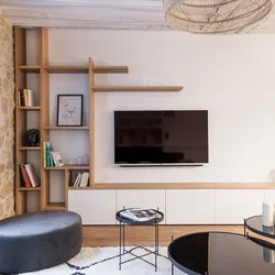Living room with TV on the wall design photo in the interior