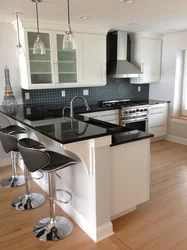 Kitchen design black with bar counter