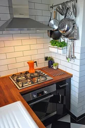 Kitchen design gas stove against the wall