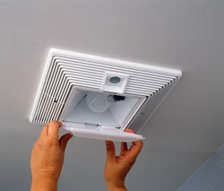 Fan in the suspended ceiling in the bathroom photo