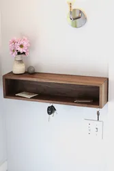 Wooden shelf for hallway photo