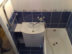 Bathroom with one faucet for bathtub and sink photo