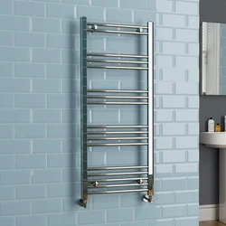 Wall-mounted dryer in the bathroom interior