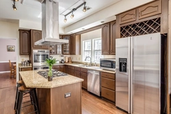 Kitchen design photo with large refrigerator photo