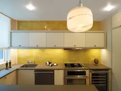 Apron in the kitchen up to the ceiling photo