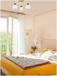 Yellow bed in the bedroom interior photo