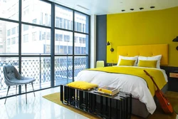 Yellow bed in the bedroom interior photo