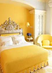 Yellow bed in the bedroom interior photo