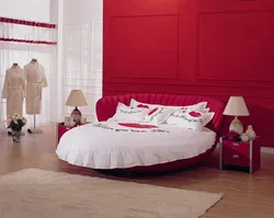 Red bed in the bedroom interior photo