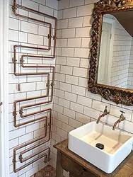 Open pipes in bathroom design