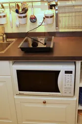 Mini oven in the kitchen photo