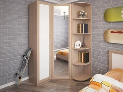 Small corner wardrobe in the bedroom for clothes photo
