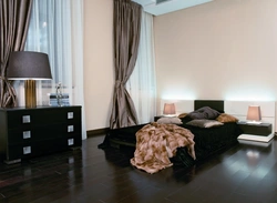 Bedroom interior with dark laminate