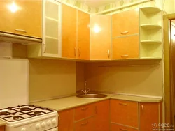 Kitchen design with a niche in the wall in the corner
