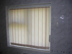 Photo of blinds in the bathroom on the window photo