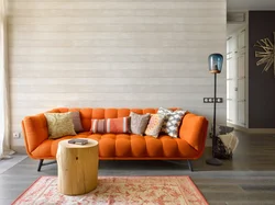 Orange sofa in the interior of the living room photo