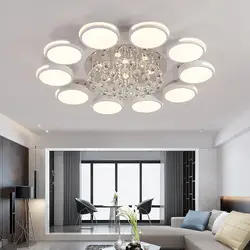 Ceiling chandelier in the living room with a low ceiling photo