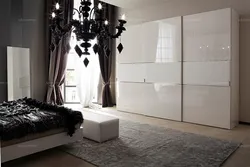Glossy wardrobes in the bedroom photo