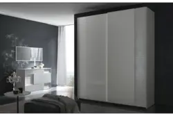 Glossy wardrobes in the bedroom photo