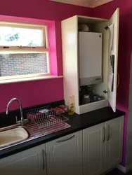 Kitchen interior with boiler and window