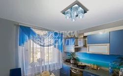 Аспалы төбенің фотосуреті бар ас үйдегі перделер