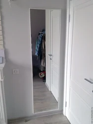 Full-length mirror in the hallway on the wall photo
