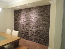 Photo of kitchen with stone panels