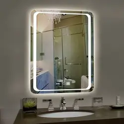 Photo of a bathtub with a mirror