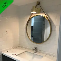 Photo of a bathtub with a mirror