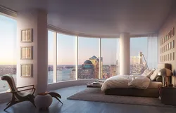 Bedroom design with panoramic windows in an apartment